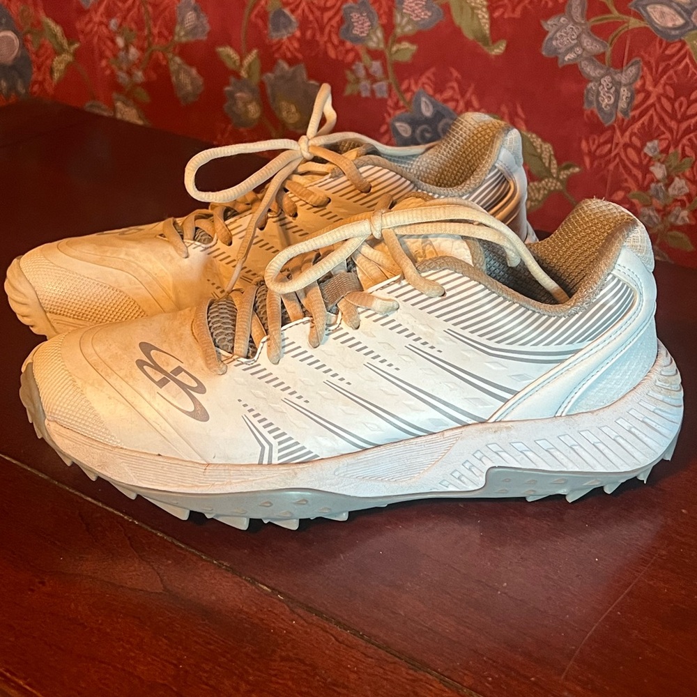 New Balance turf shoes, women’s size 9, worn a few times, like new.